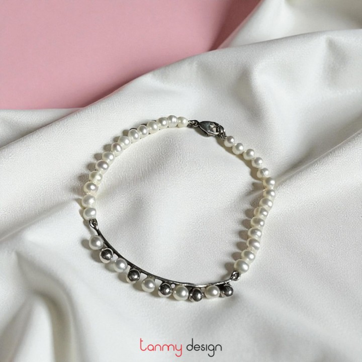 Vòng tay ngọc trai phối thanh bạc phối bi